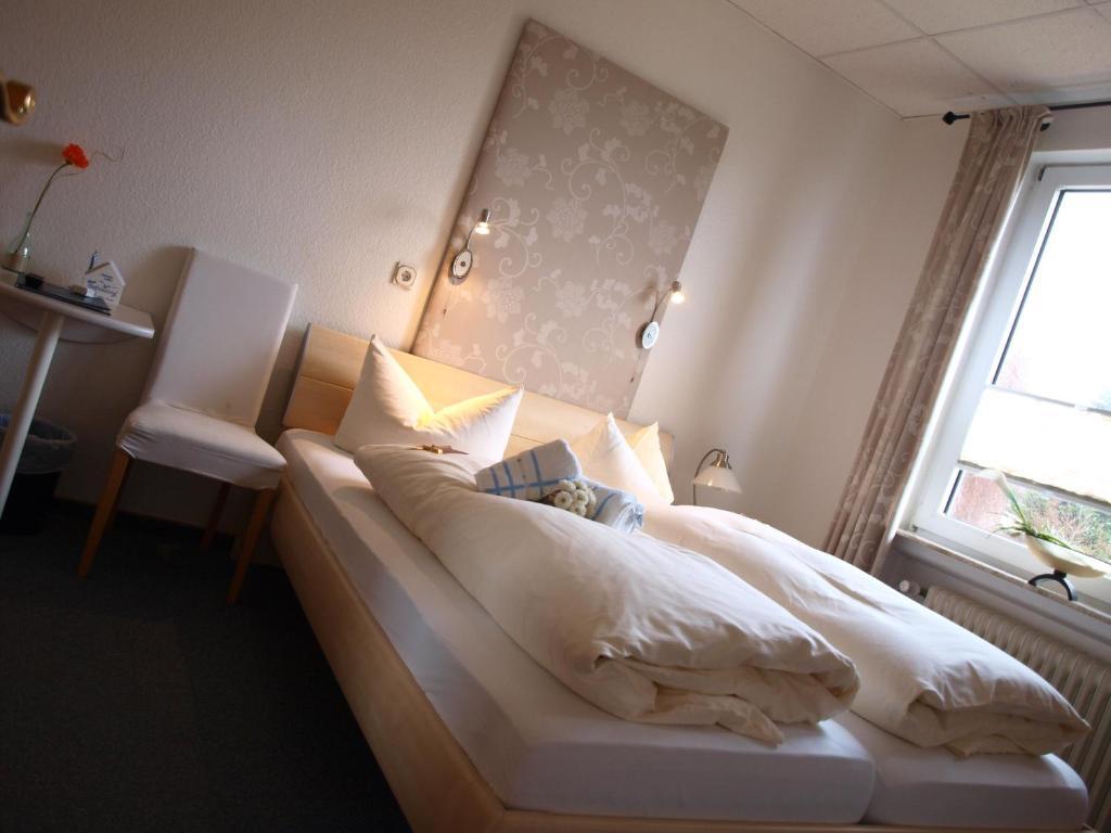 Hotel Ostfriesland Garni Norden Habitación foto